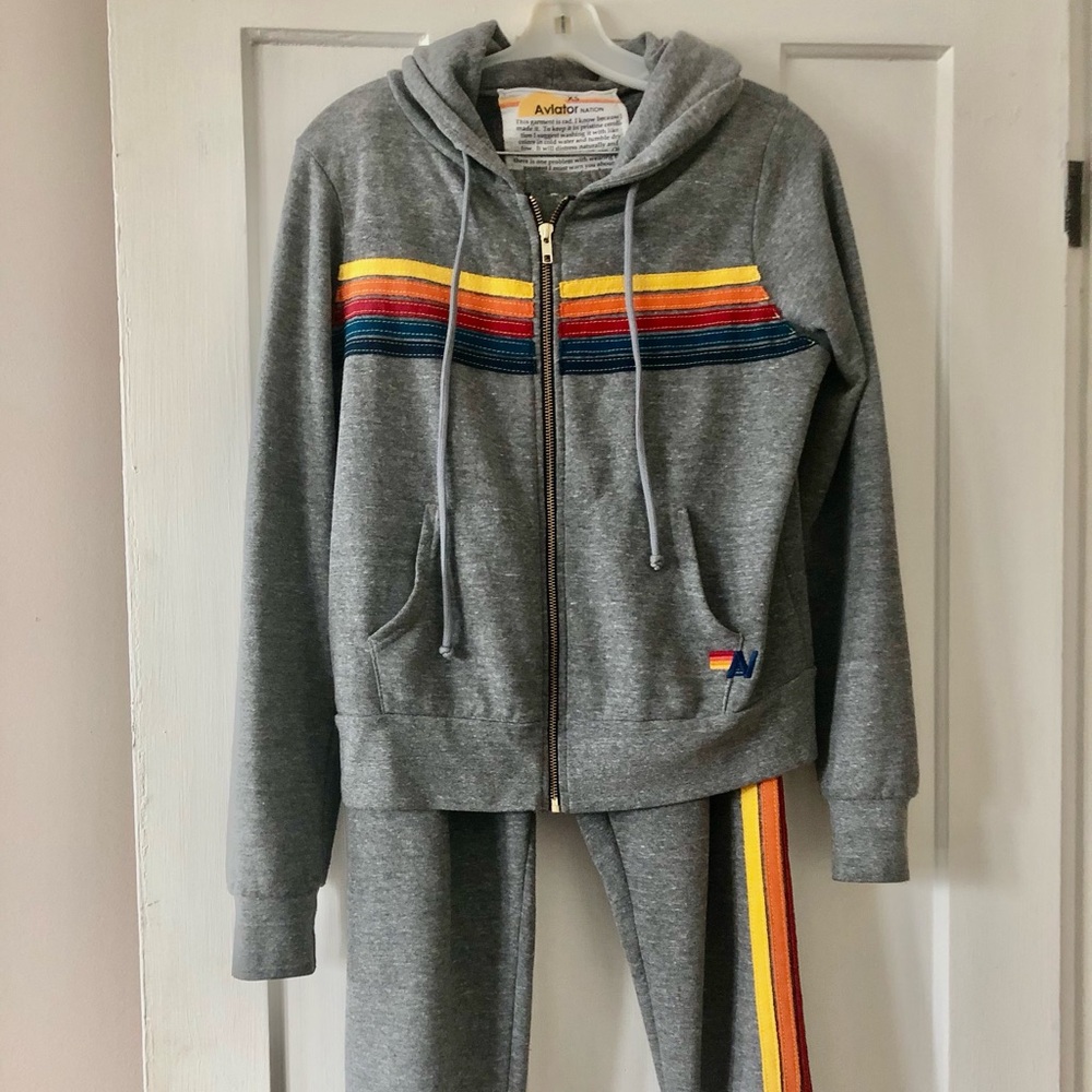 Zip up is size XS - sweat pants are size Small. Excellent condition.